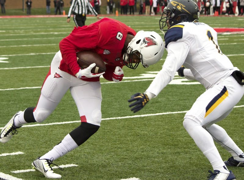 Ball State senior wide receiver Jordan Williams prepares for a tackle during the homecoming game against the University of Toledo on Oct. 3 at Scheumann Stadium. (Grace Ramey)
