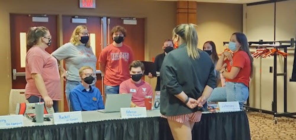 Student Government Association (SGA) President Tina Nguyen talks with SGA senators at the meeting Sept. 29. Senators discussed upcoming events including a climate strike, the “Hit the Books Bash” and plans for a sexual assualt awareness event. Nathan Hill, DN