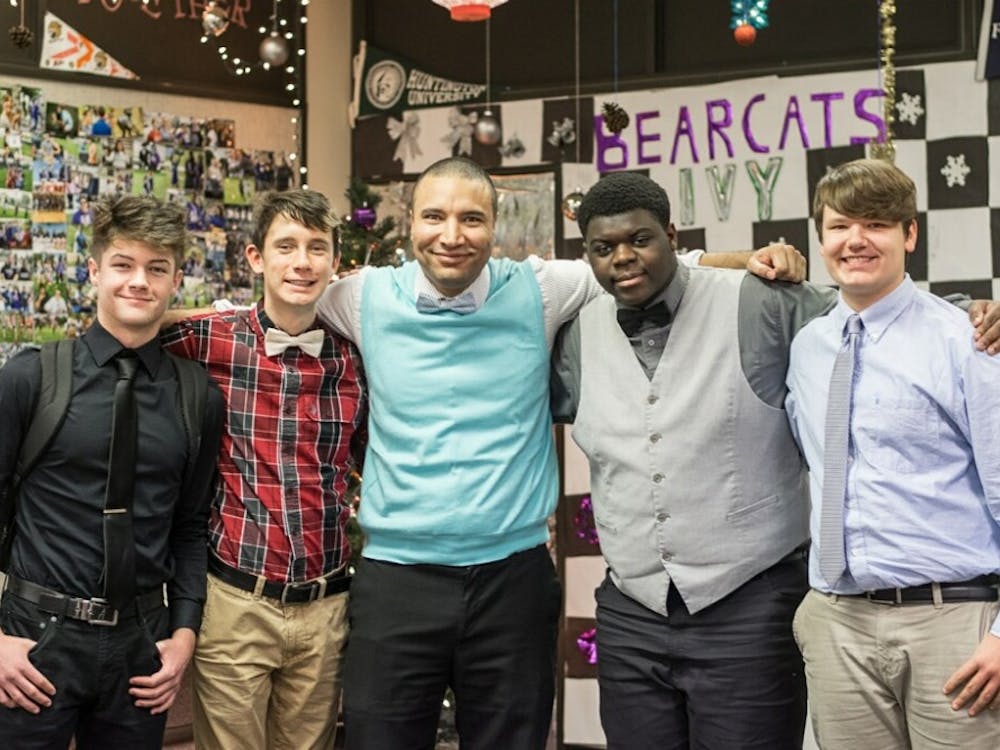 MCHS students participate in the 2018 Dressember event along with Khalid Reichard, early college coordinatory (center). Sam Voss (second from left) said Reichard was his biggest supporter on campus and sponsored Dressember in every way. Sam Voss, Photo Provided