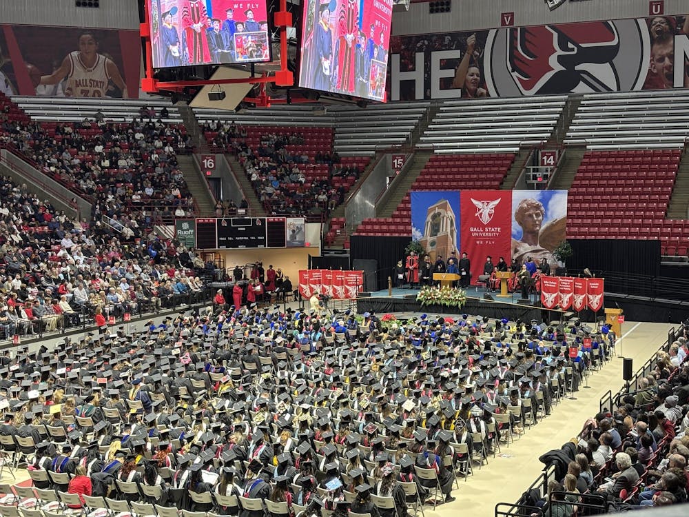 Ball State University graduates sit in Worthen Arena, Dec. 14, waiting to receive their degrees. This ceremony marked the 200th commencement for the university. Trinity Rea, DN. 