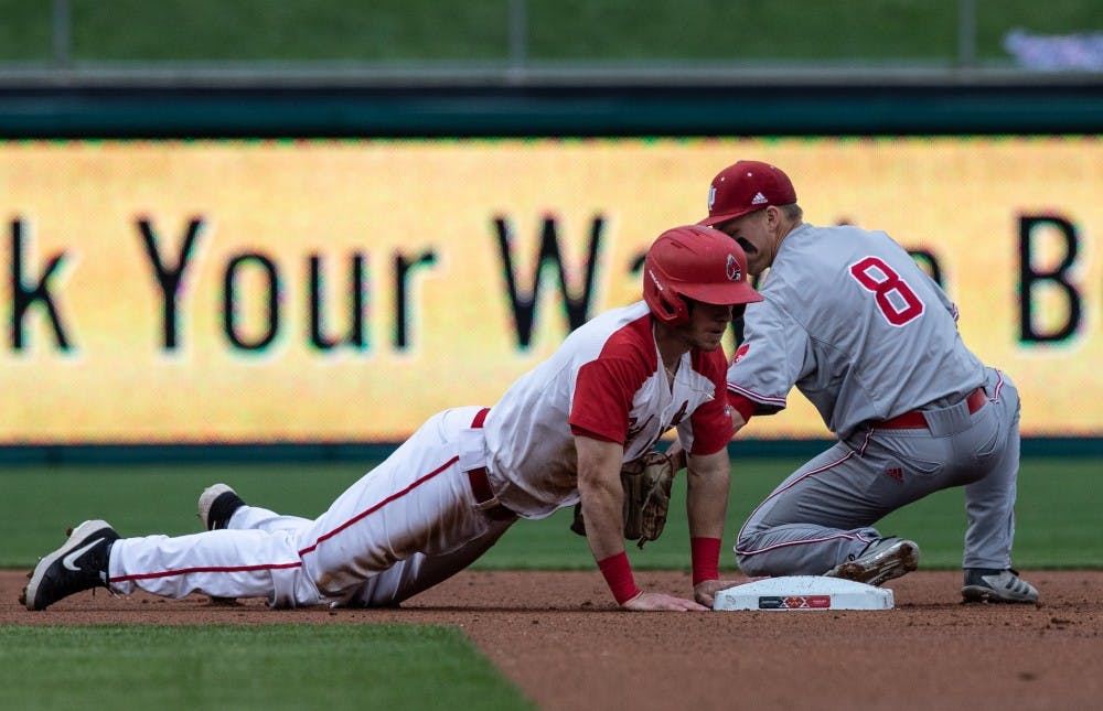 Junior right fielder Ross Messina dives into second base during the third inning &nbsp;at Victory Field in Indianapolis April 23, 2019. Messina was the only Cardinal to have multiple hits in the game. Rebecca Slezak, DN