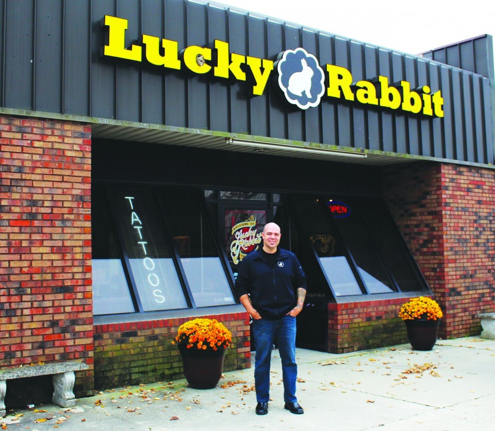 Daniel Stewart, the owner of Lucky Rabbit, stands in front of his shop Nov. 5, 2018. Stewart has been a tattoo artist for almost 25 years. Michaela Kelley,DN