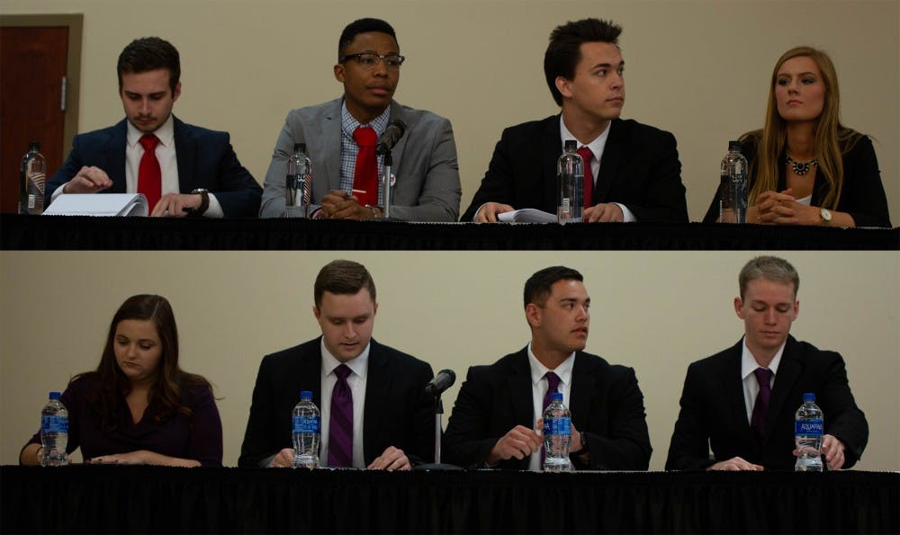 <p>Candidates from the Empower and Elevate slates remain seated during the final All-Slate Debate of the 2019 Student Government Association (SGA) Election March 11, 2019 in the L.A. Pittenger Student Center ballroom. The final round of voting will take place March 18-19, 2019. <strong>Scott Fleener, DN</strong></p>