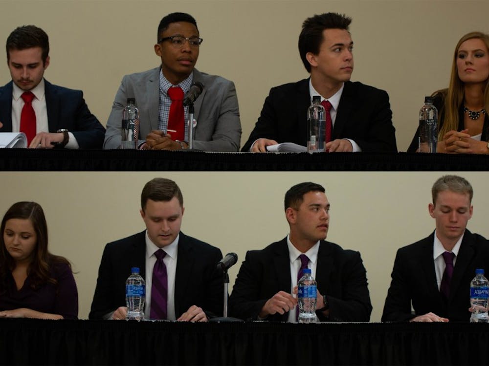 Candidates from the Empower and Elevate slates remain seated during the final All-Slate Debate of the 2019 Student Government Association (SGA) Election March 11, 2019 in the L.A. Pittenger Student Center ballroom. The final round of voting will take place March 18-19, 2019. Scott Fleener, DN