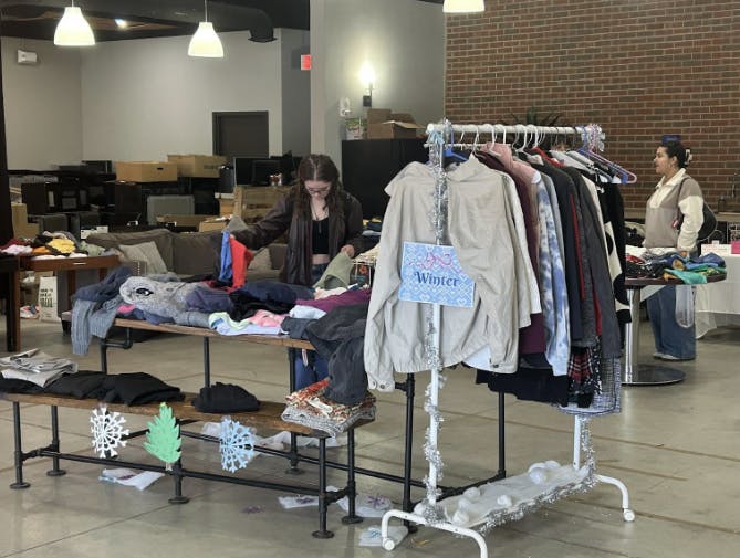 Ball State students browse a selection of clothes at the FISC pop-up shop from Oct. 23 to Oct. 25 at the Village Promenade Warehouse.

Dylan Chesnut, NewsLink Indiana