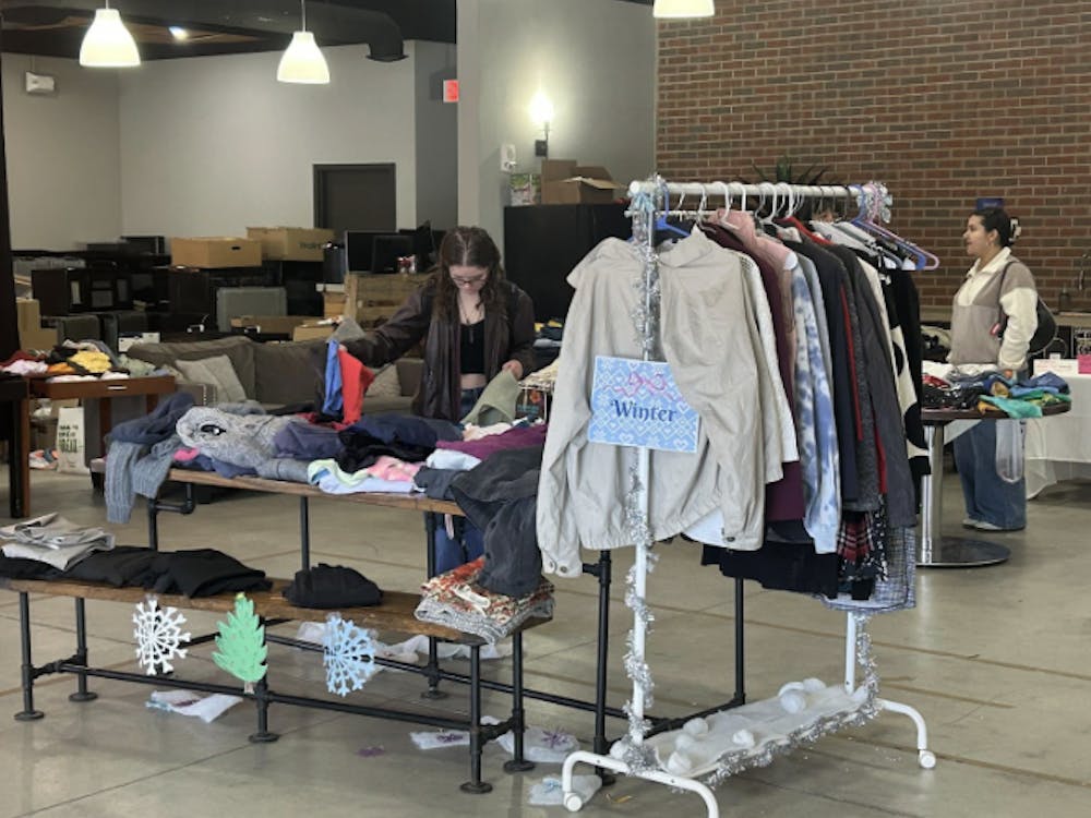 Ball State students browse a selection of clothes at the FISC pop-up shop from Oct. 23 to Oct. 25 at the Village Promenade Warehouse.
Dylan Chesnut, NewsLink Indiana