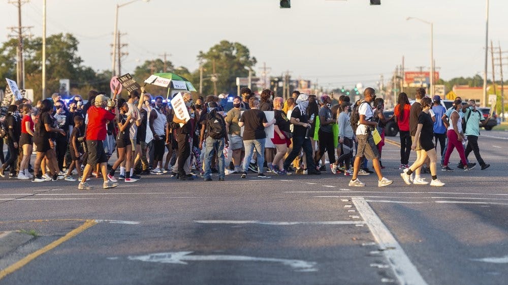 Main image: Protesters march Sunday, Aug. 23, 2020, in Lafayette, La. Trayford Pellerin was fatally shot by police Friday night in Lafayette. Police have said Pellerin was carrying a knife and was shot when he tried to enter one convenience store in Lafayette after causing a disturbance at another. (Scott Clause/The Daily Advertiser via AP)