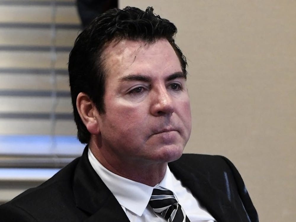 Founder of Papa John's John Schnatter resigned as chairman of the board last week after using a racial slur on a conference call. Now, he is suing the company. AP Photo.&nbsp;