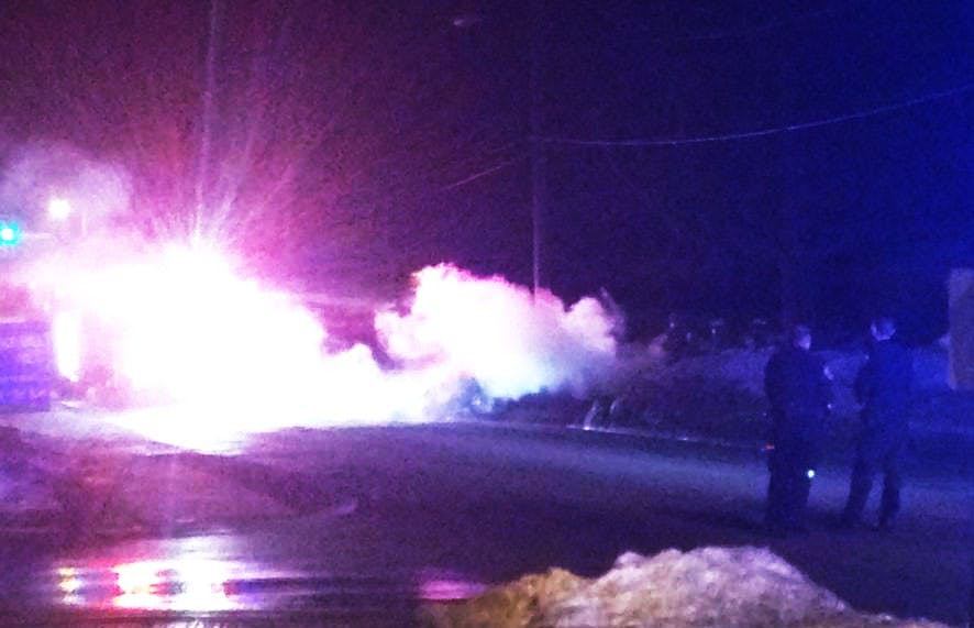 	A car caught fire at the corner of Light Street and Riverside Avenue Tuesday night. NEWSLINK PHOTO ROBERT CONNETT