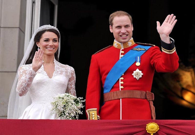 Prince William and  Kate Middleton wave to the crowd from a balcony at Buckingham Palace after  their wedding in London, England, on Friday, April 29, 2011. (Abaca Press/MCT)
