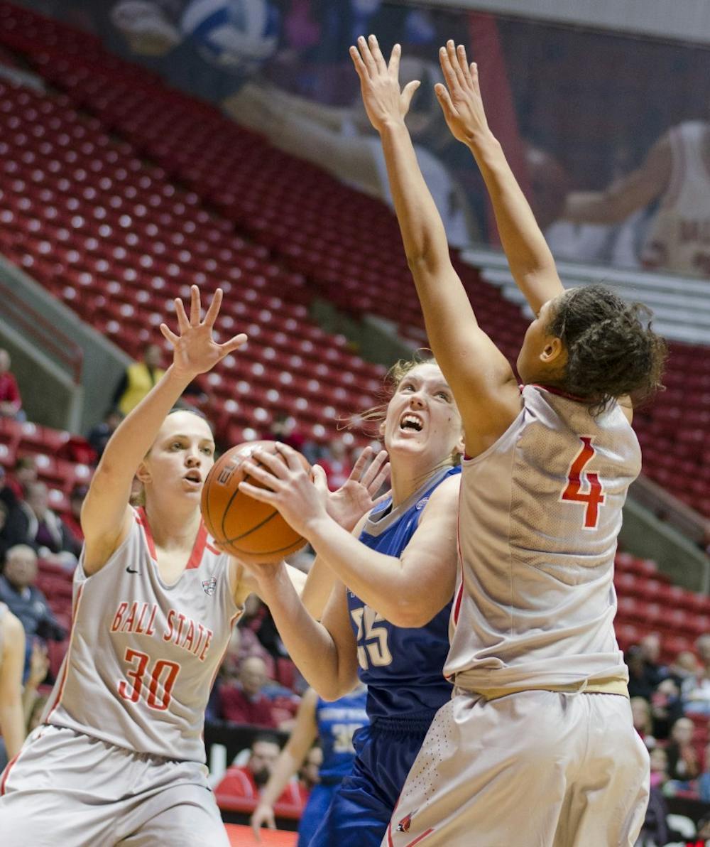 Freshman forward Shelby Merder and sophomore guard Nathalie Fontaine try to block a Buffalo player in the first half Jan. 26 at Worthen Arena. DN PHOTO BREANNA DAUGHERTY