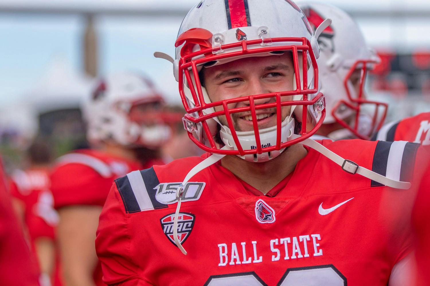 Redshirt freshman Mitchell Carter stands with his teammates Oct. 19, 2019, at Scheumann Stadium. Carter plays fullback for the Ball State Cardinals. Jacob Musselman, DN