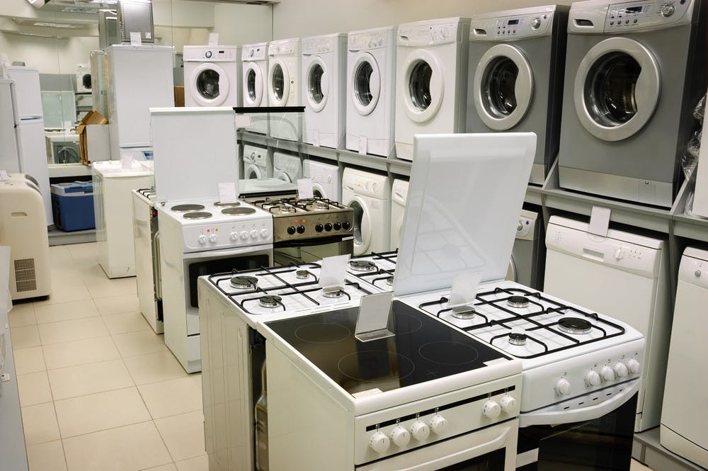 washing machines, stoves and ovens selling in appliance store