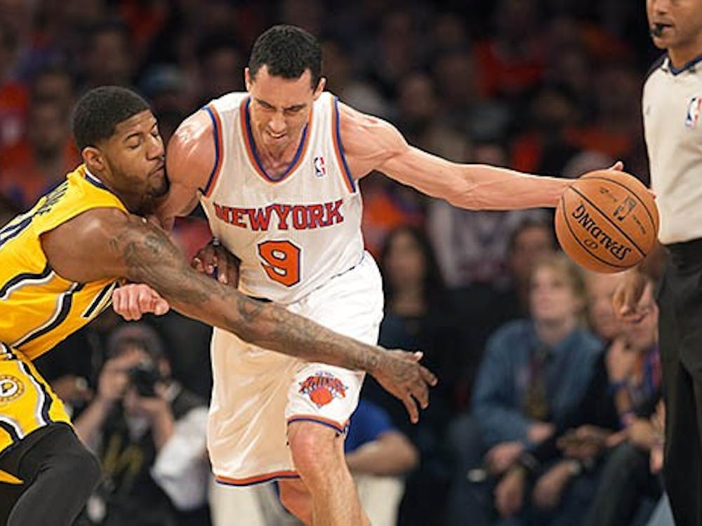 New York Knicks' Pablo Prigioni guards the ball from the Indiana Pacers' Paul George during the first quarter in the NBA's Eastern Conference playoffs at Madison Square Garden in New York on May 5. The Pacers won the series with the win in Indianapolis on Saturday. MCT PHOTO