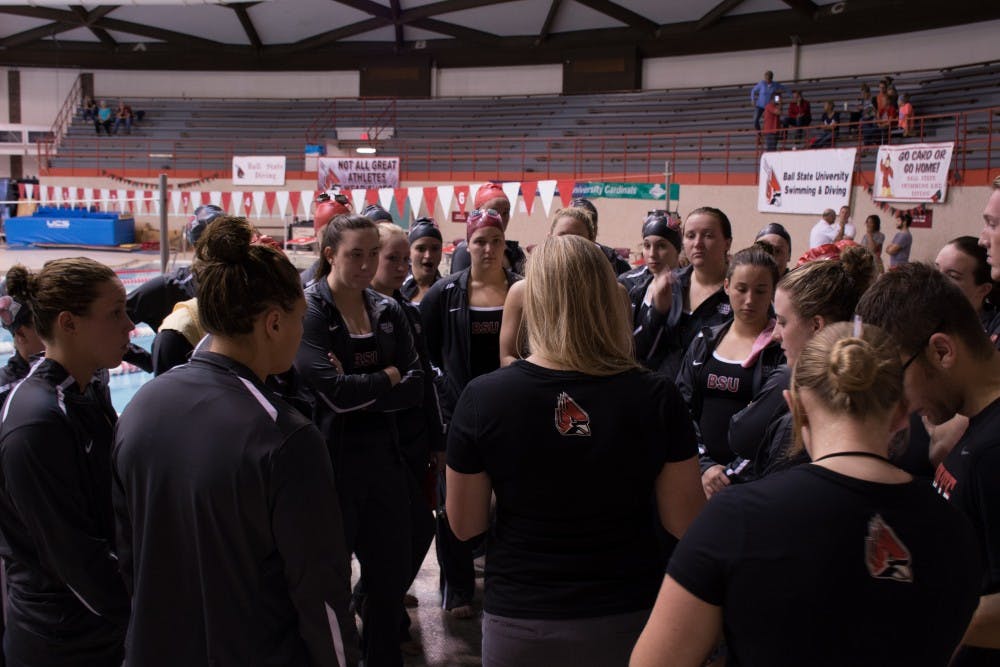 Head coach Kristy Castillo talks to the Ball State Women's swim team before the Red and White meet in the Lewellen Pool on Oct. 8, 2016. The red team won 117-105. Kaiti Sullivan // DN