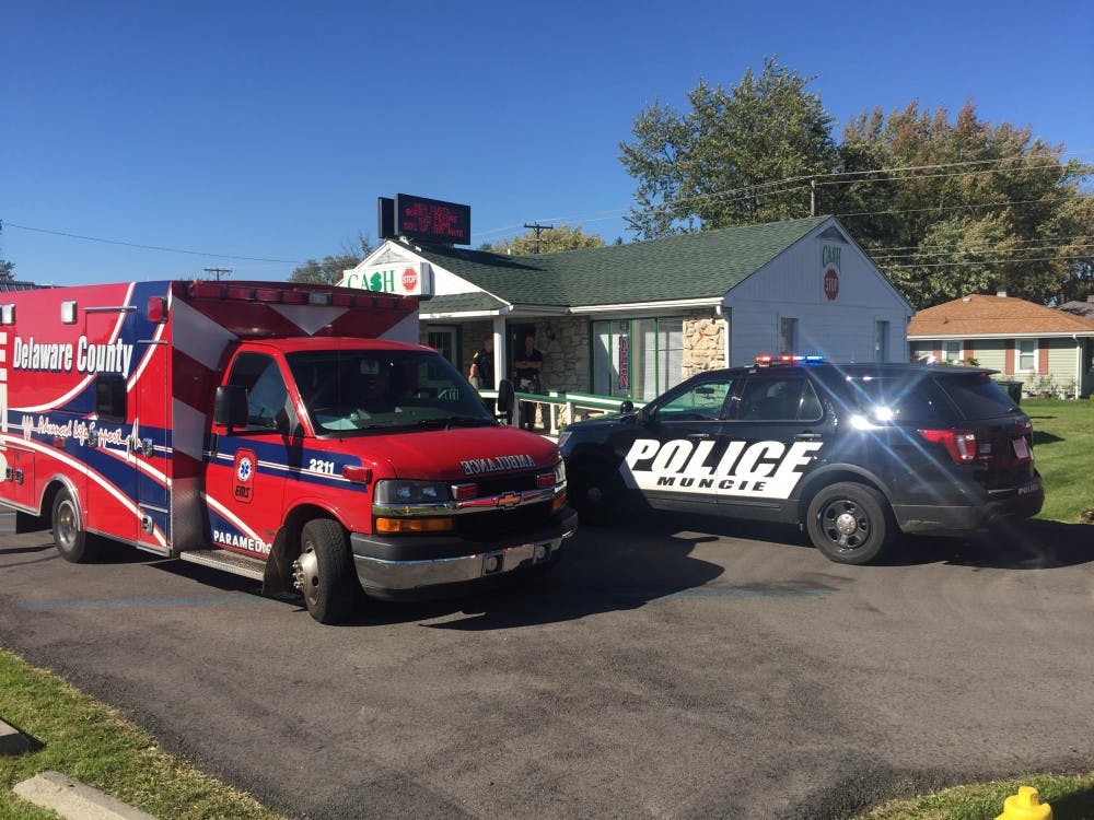 <p>Muncie Police Department and Delaware County EMS responded to reports of a shooting on the 1000 block of W. McGalliard Road on Wednesday, Oct. 18, 2017. <strong>Max Lewis, DN</strong></p>