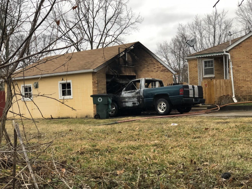 <p>Muncie Fire Department was dispatched to the 2100 block of S. May Ave Monday, Jan. 22, on reports of a structure fire. Parts of the garage and the owner's truck were burned during the fire. <strong>Andrew Smith, DN Photo</strong></p>