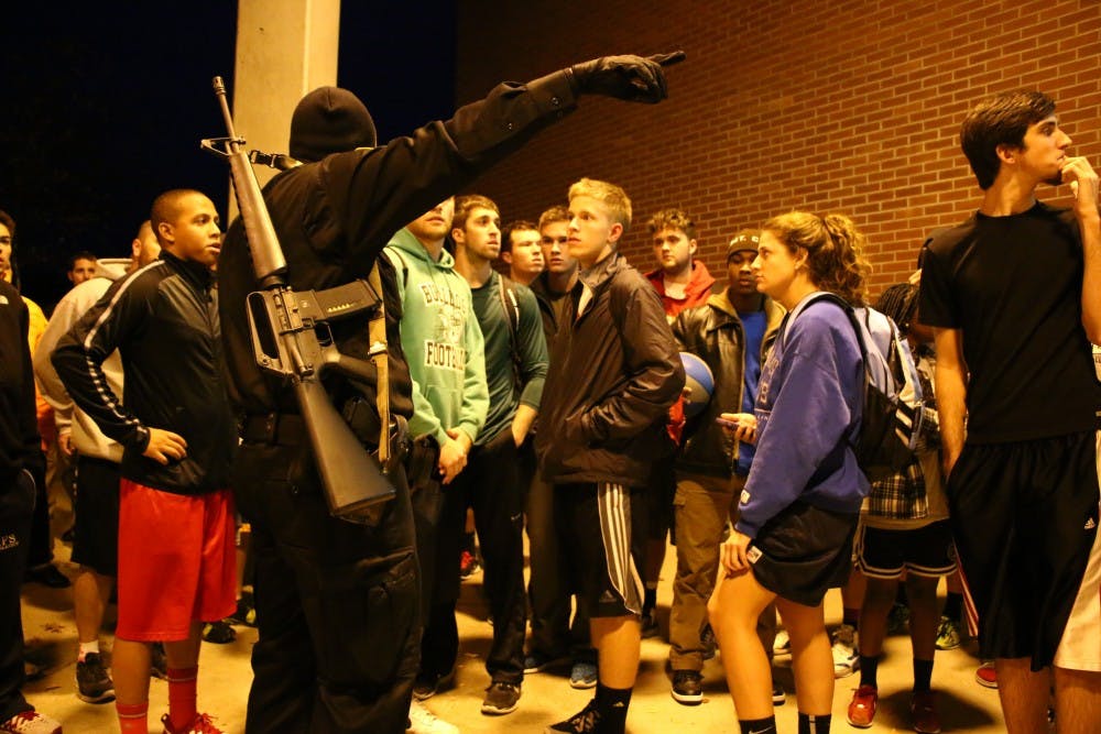Police secure the Student Recreation and Wellness Center after a report of an armed assailant in the rec center. DN PHOTO STAFF REPORTS