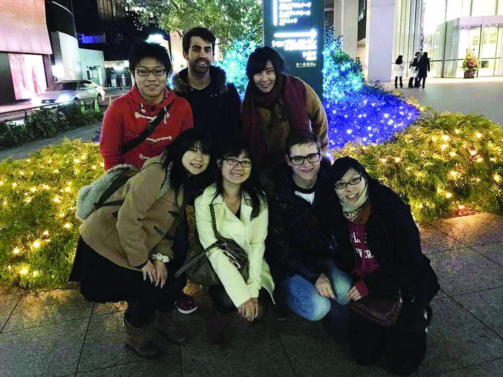 Ball State alumnus Conner Zelmer (second row center) spends time with his friends from Ball State in Tokyo, including Ai Shikano (front row left) and Jesse Taskovic (front row third from the left). Ai and Taskovic both pushed Zelmer to apply for the MEXT scholarship. Conner Zelmer, photo provided. 