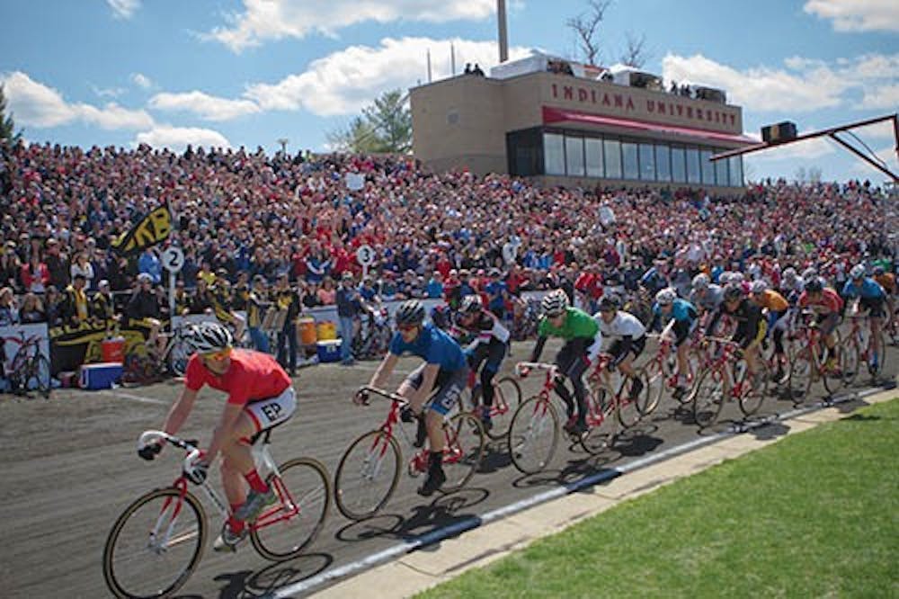 Riders race in the men’s Little 500 Race on April 20, 2013 at Bill Armstrong Stadium during Indiana University’s annual event. The race brings out students from many universities as they take part in the festivities of the weekend. PHOTO COURTESY OF THE INDIANA DAILY STUDENT