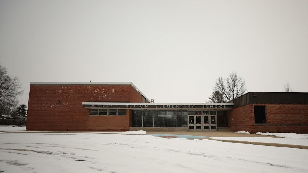 Tables, chairs, bicycles, deteriorating welcome boards and other objects lay dormant in the former Wilbur E. Sutton Elementary School — lost and forgotten.