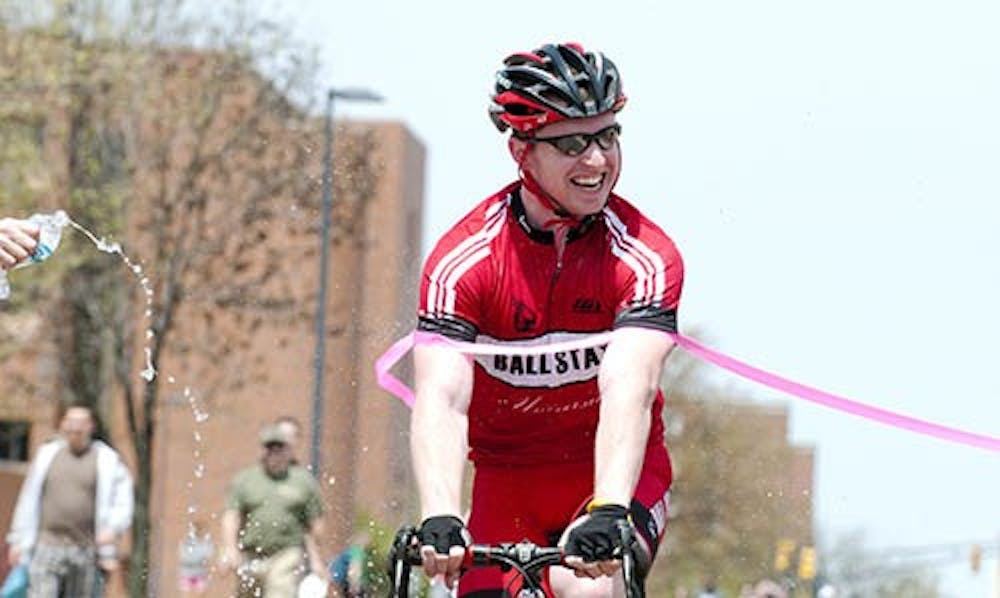 Junior Adam James is splashed with water as he crosses the finish line winning the 20 lap race. The sixth annual McKinley Mile will be going on this Saturday starting at noon. DN FILE PHOTO BOBBY ELLIS