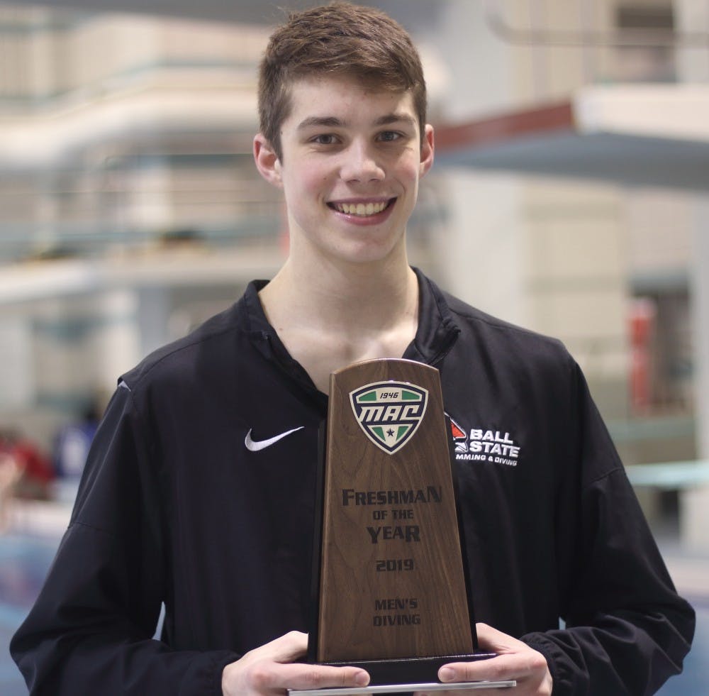 Freshman Hunter Ongay with the 2019 Mid-American Conference Freshman Diver of The Year Award at the 2019 MAC Swimming and Diving Championships March 7, 2019. Ongay is the first Cardinal to receive the award since Rachel Bertram for the women's team in 2017. Patrick Murphy, DN&nbsp;
