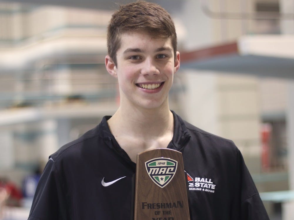 Freshman Hunter Ongay with the 2019 Mid-American Conference Freshman Diver of The Year Award at the 2019 MAC Swimming and Diving Championships March 7, 2019. Ongay is the first Cardinal to receive the award since Rachel Bertram for the women's team in 2017. Patrick Murphy, DN&nbsp;
