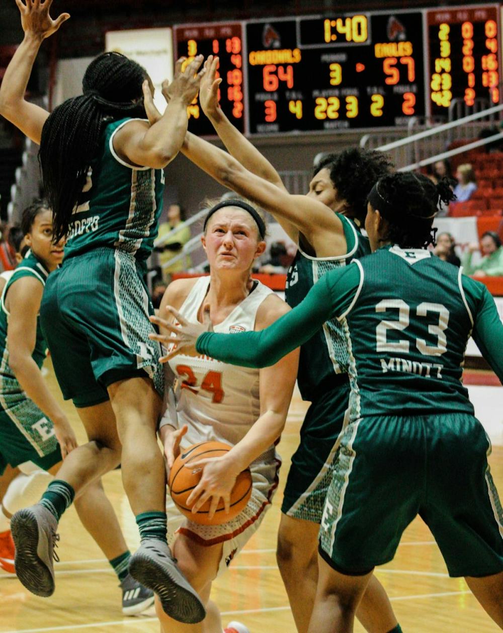 <p>Ball State senior Jasmin Samz pushes through the defense of the Eagles during the Ball State vs. Eastern Michigan Women’s Basketball game Feb. 7 in Worthen Arena. The cardinals lost their season opener to Purdue 80-38. <strong>Carlee Ellison, DN</strong></p>