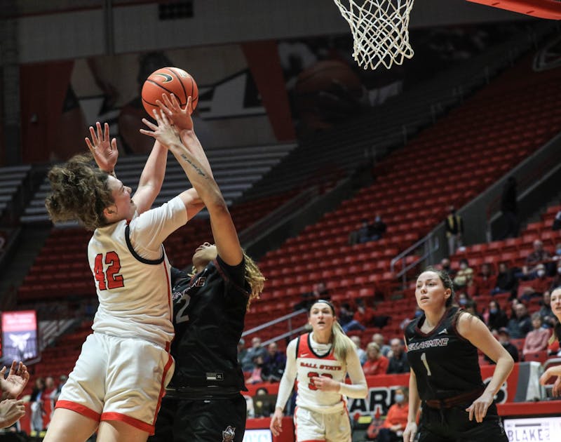 Ball State Junior Annie Rauch goes up for a layup against a defender at Worthern Arena Dec. 20. Ball State took on Bellarmine University at home, winning 84-63 over the Knights. Eli Houser, DN