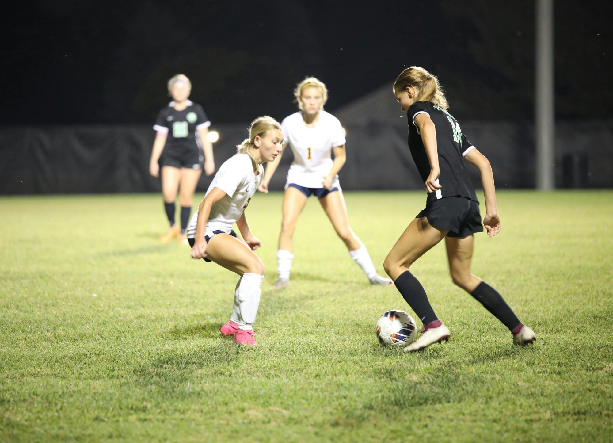 The Yorktown ball carrier tries to get by the Delta defender Sep. 28 at Yorktown High School. Trinity Rea, DN.