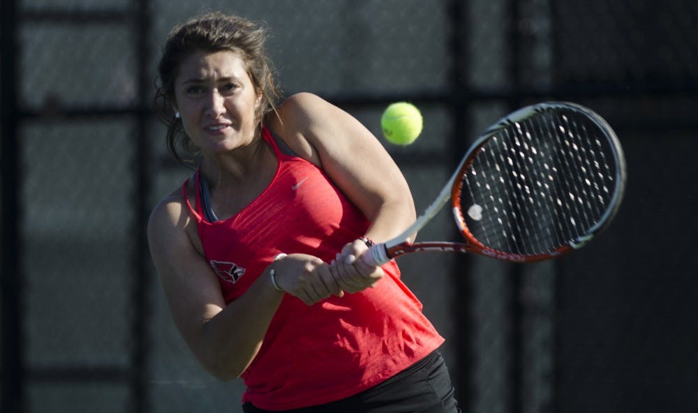 Senior Julia Sbircea hits a backhand during her doubles match against IUPUI on Feb. 19, 2017. Emma Rogers, DN File