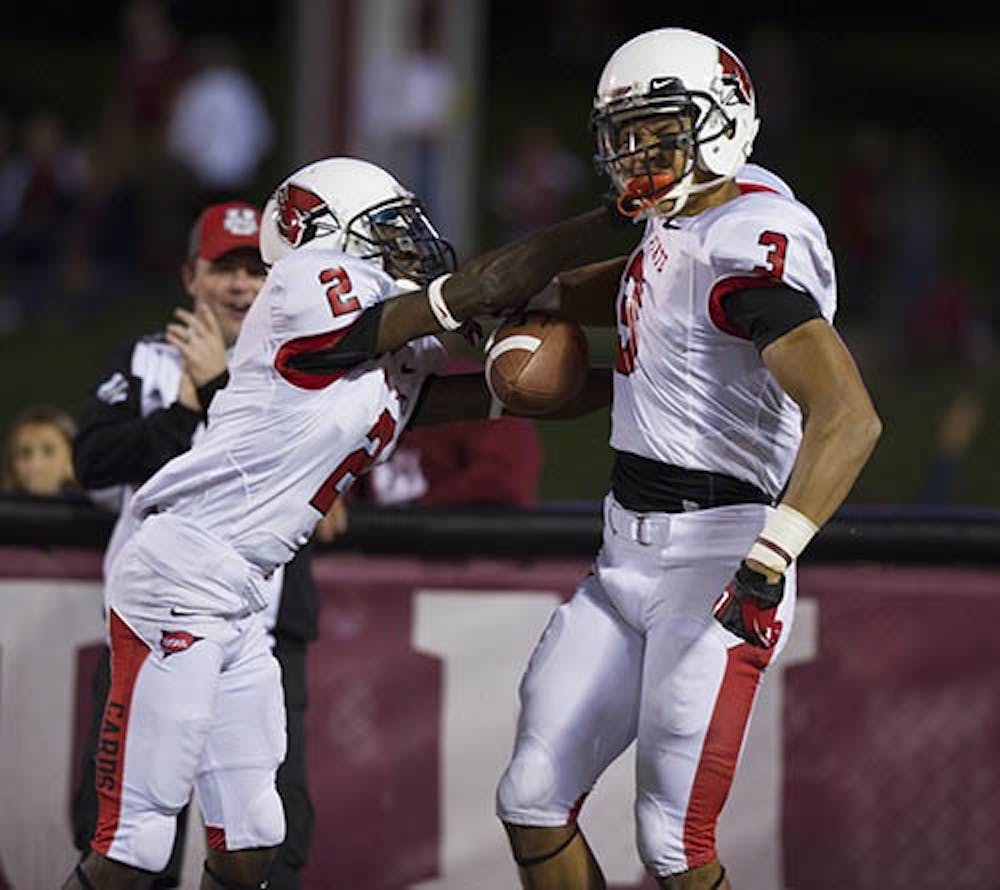 Ball State wide receivers Jamill Smith and Willie Snead celebrate after a Ball State touchdown against Indiana on Sept. 15, 2012. Snead finished 19th in the country in receiving yards and will be returning to the Cardinals for the 2013 season. DN FILE PHOTO BOBBY ELLIS