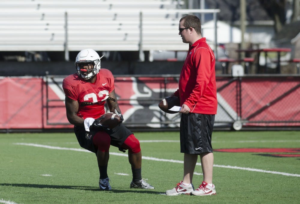 Senior running back Jahwan Edwards practices with the team on Friday. Edwards has been working on catching passes in practice. DN PHOTO BREANNA DAUGHERTY 