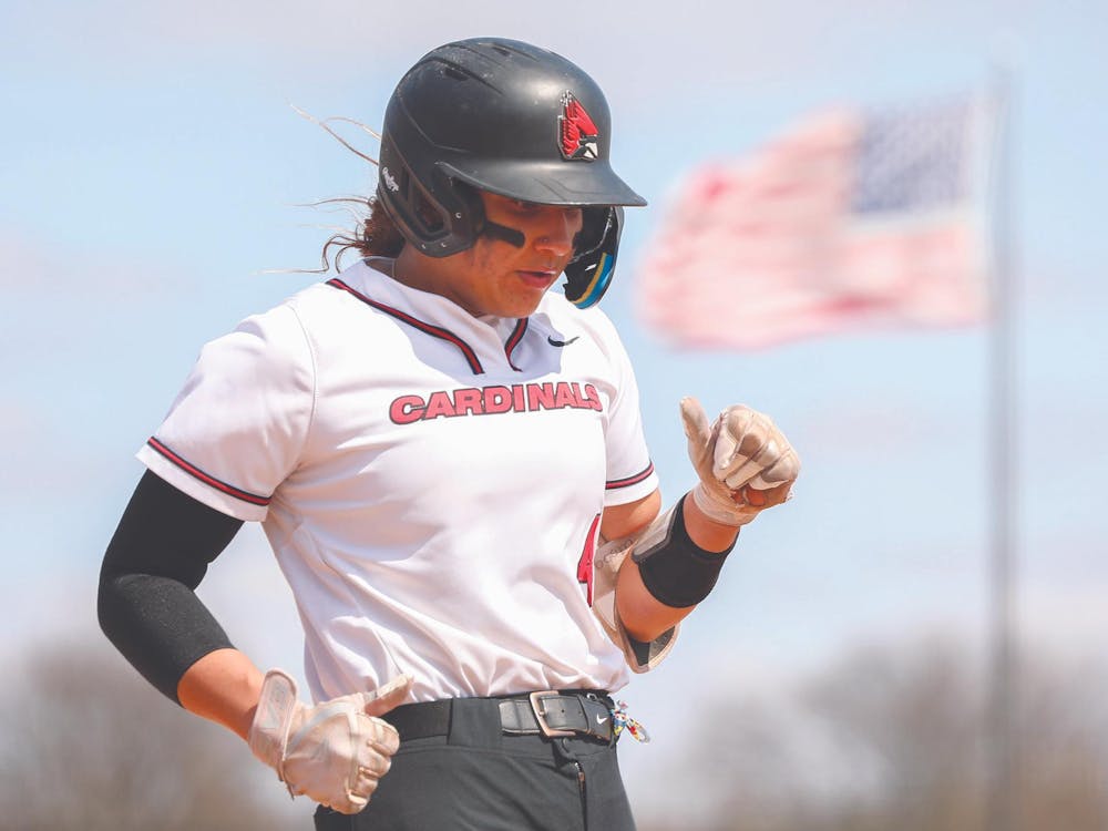 Redshirt senior McKayla Timmons runs into home base April 1 against Northern Illinois University at Ball Diamond. Timmons has 54 home runs, 195 hits and a career batting average of .387. Andrew Berger, DN