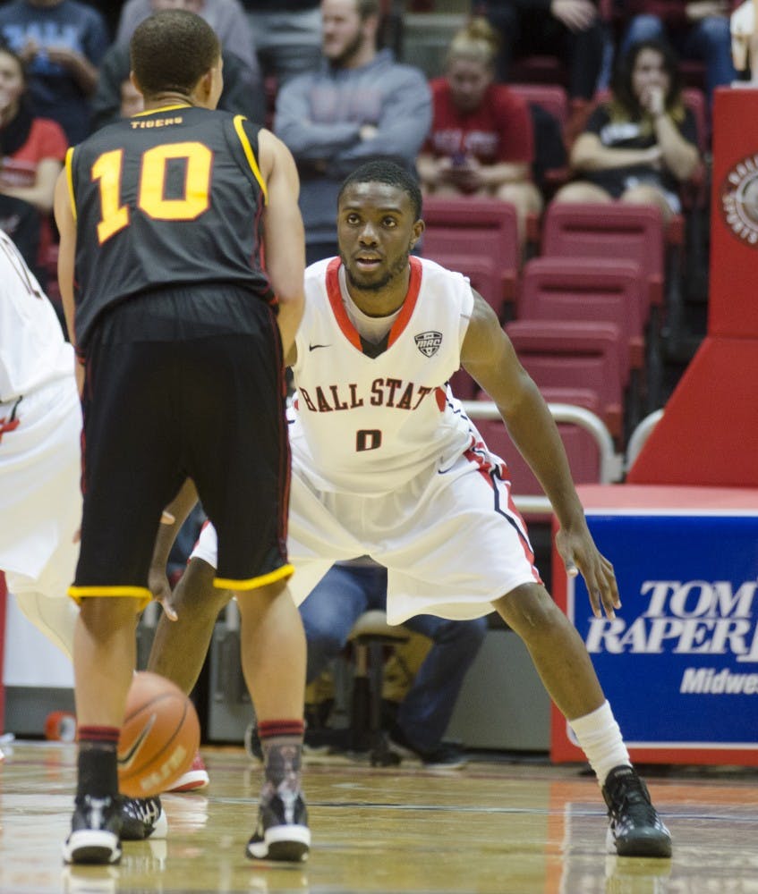 Freshman guard Francis Kiapway attempts to guard a Grambling player during the game on Nov. 24 at Worthen Arena. DN PHOTO BREANNA DAUGHERTY