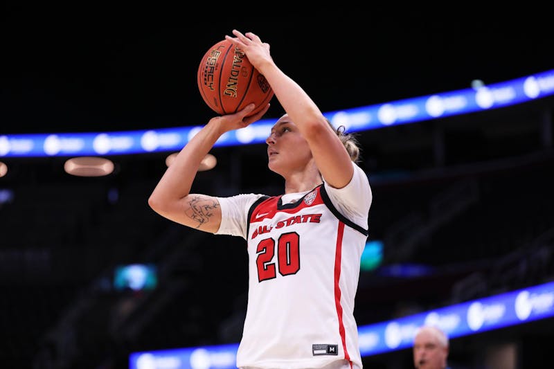 Junior Alex Richard shoots the ball against Kent State March 15 at Rocket Mortgage FieldHouse in Cleveland, Ohio. Richard scored two points in the first half. Mya Cataline, DN