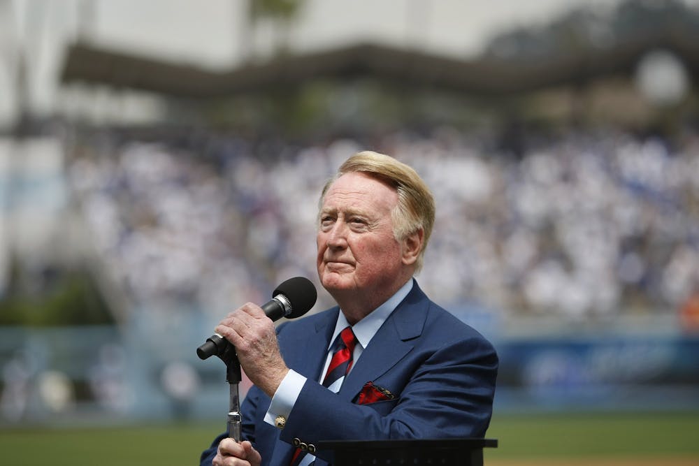 Los Angeles Dodgers announcer Vin Scully looks into the stands before announcing "It's time for Dodgers baseball," before the team's season opener against the San Francisco Giants in April 2009. (Allen J. Schaben/Los Angeles Times/TNS)