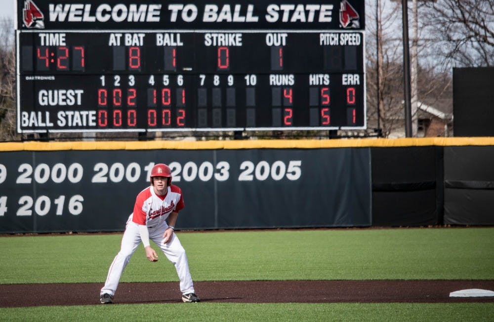 <p>Senior Colin Brockhouse, leads off second base during the Cardinals' game against Dayton on March 16 at the baseball diamond at First Merchants Ballpark Complex. <strong>Rebecca Slezak, DN File</strong></p>