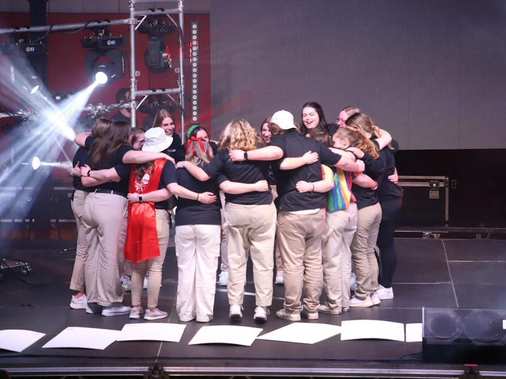 members of the 2024 Dance Marathon Executive board share a group hug after revealing the final number of donations at Dance Maraton Feb.10 at the Jo Ann Gora Student Recreation and Wellness Center. Olivia Ground, DN