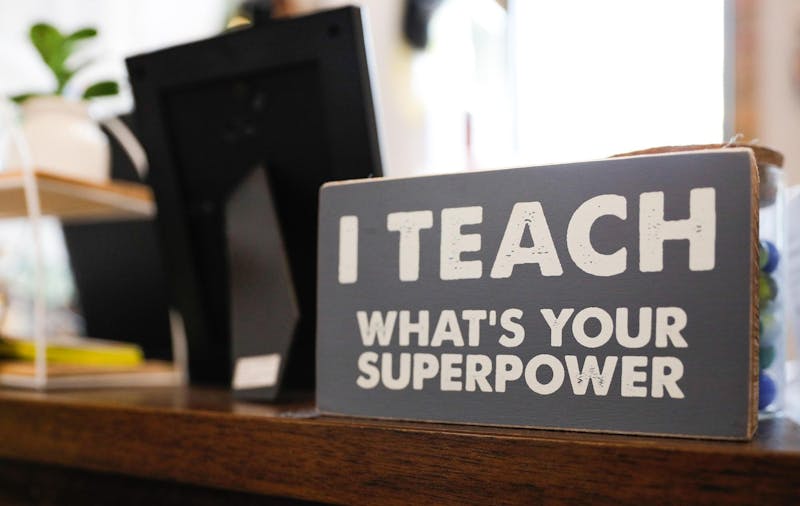 A sign reading, “I teach; what’s your superpower?” on fourth grade teacher Heather Veatch’s desk Oct. 1 at East Washington Academy. Education Resource Strategies, a national nonprofit that helps with resource management in school systems, found that 23 percent of teachers left their school during the 2022-23 school year. Andrew Berger, DN 
