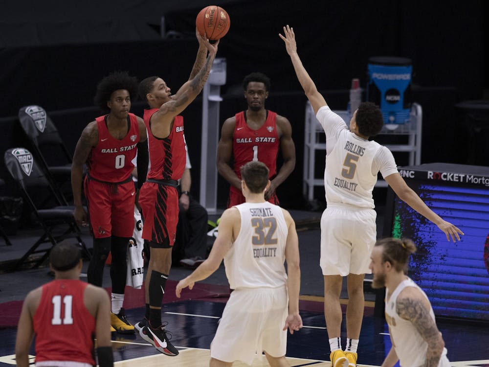 Cardinals senior guard Ishmael El-Amin shoots a three pointer during the second half of the quarterfinals game of the Mid American Conference Tournament against the Toledo Rockets March 11, 2021, at Rocket Mortgage Fieldhouse in Cleveland, Ohio. The Cardinals lose to the Rockets 91-89 in overtime. Jacob Musselman, DN