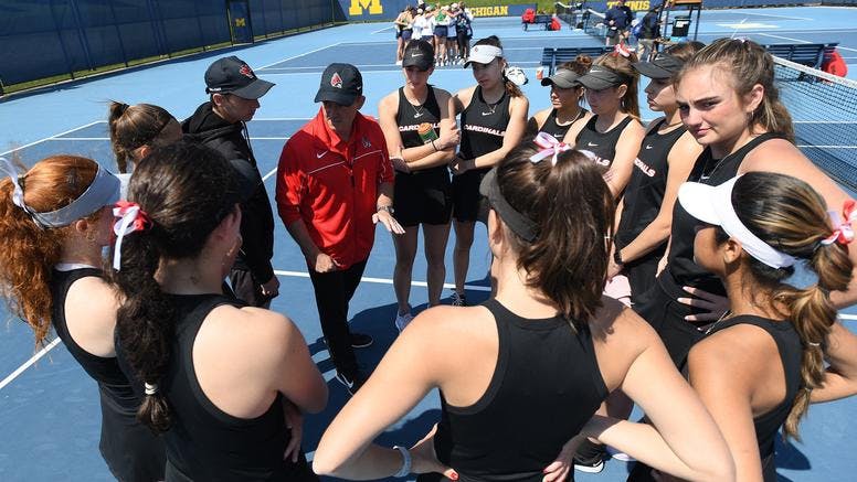 Ball State Women's Tennis huddles together during a timeout against Notre Dame in the first round of the NCAA Tournament May 5. The Cardinals would go on to lose the match. Ball State Athletics, photo courtesy