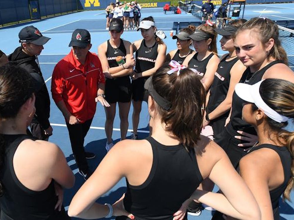 Ball State Women's Tennis huddles together during a timeout against Notre Dame in the first round of the NCAA Tournament May 5. The Cardinals would go on to lose the match. Ball State Athletics, photo courtesy