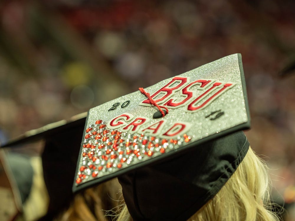 A Ball State Graduate decorated their cap, December 14, 2019, at John E. Worthen Arena. Graduates were greeted by faculty members from their colleges as they received their diplomas. Jacob Musselman, DN