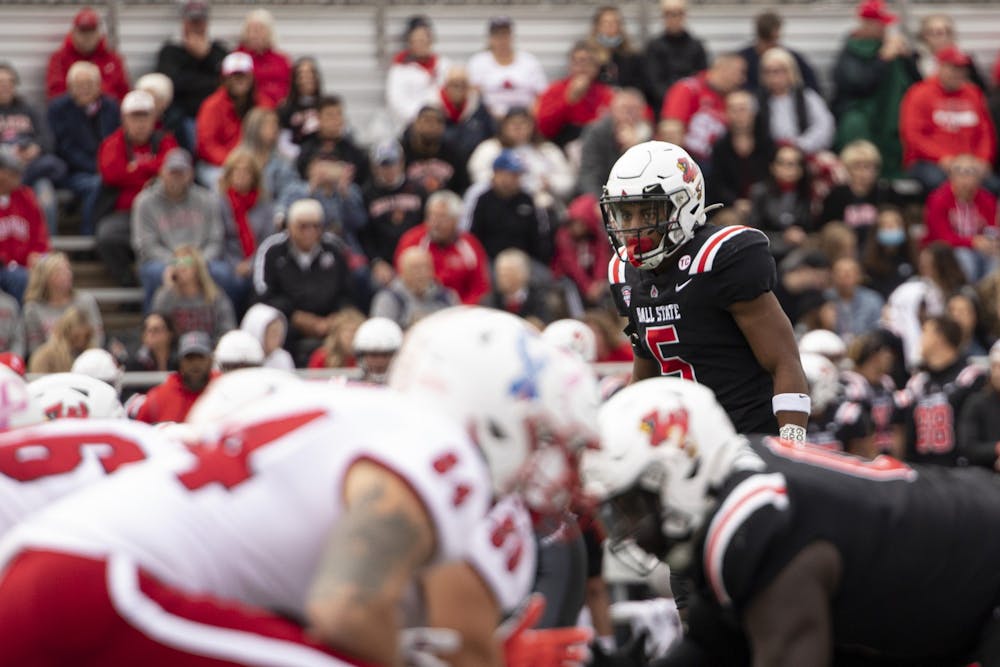 Cardinals fifth-year safety Bryce Cosby looks over lineman Oct. 23, 2021, at Scheumann Stadium. The Cardinals lost the Redbird Rivalry 24-17. Jacob Musselman, DN