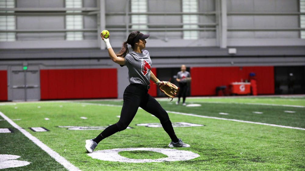 Senior outfielder Hannah Dukeman throws the ball during a practice Jan. 26 at Scheumann Family Indoor Practice Facility. Dukeman played in 76 of 135 total games of her Ball State career. Mya Cataline, DN