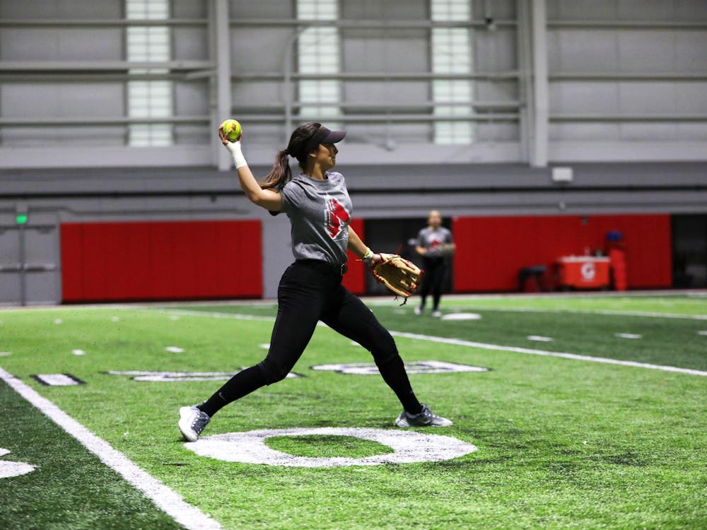 Senior outfielder Hannah Dukeman throws the ball during a practice Jan. 26 at Scheumann Family Indoor Practice Facility. Dukeman played in 76 of 135 total games of her Ball State career. Mya Cataline, DN