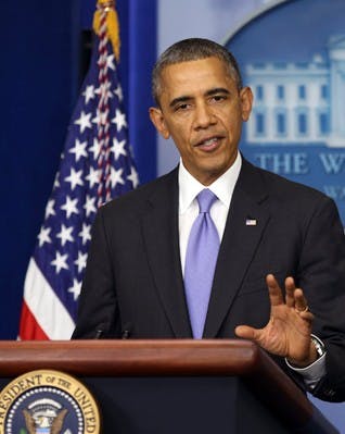 President Barack Obama makes a statement following the Senate&apos;s vote on the debt ceiling and reopening the government on Wednesday, October 16, 2013, in Washington, D.C. (Martin H. Simon/Pool/Abaca Press/MCT)