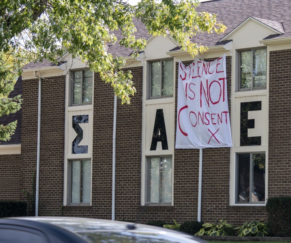 Ball State's Sigma Alpha Epsilon chapter hangs a bed sheet outside its house. Ball State fraternities hung bedsheets with messages of consent in front of their houses Oct. 15, 2018. Stephanie Amador, DN